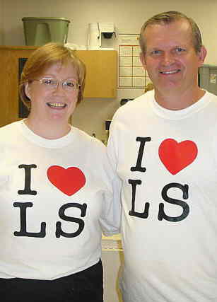 Photo of Larsons serving in the Lime Springs Community Center.